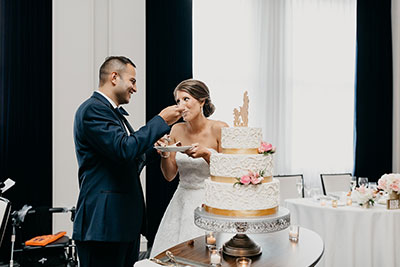 cutting wedding cake 