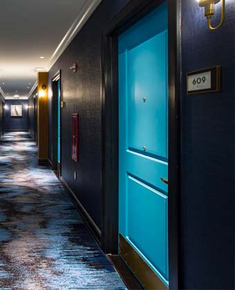 Eclectic Chicago Hotel Guest room hallway